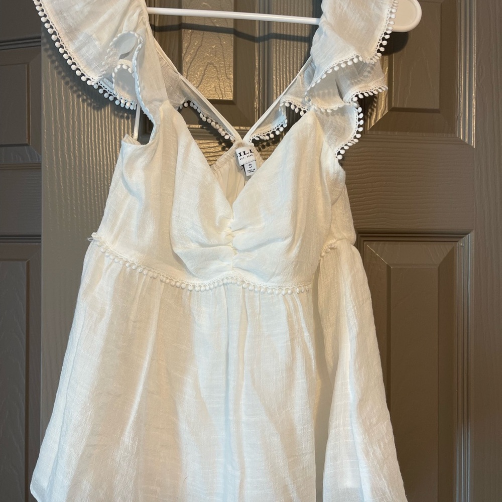 White Ruffled Sleeveless Top
